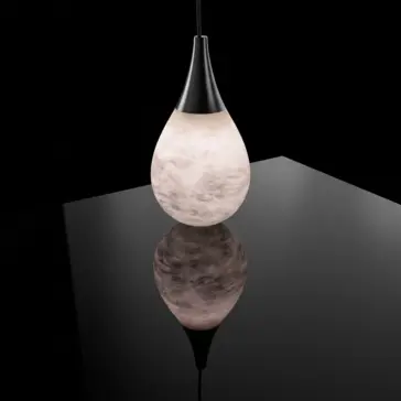 High-End Tear Drop Light A Sculptural Alabaster Teardrop Pendant Light emits a soft white glow above a glossy black surface, its elegant form reflected below. The dark background emphasises the refined artistry of this pendant lamp.