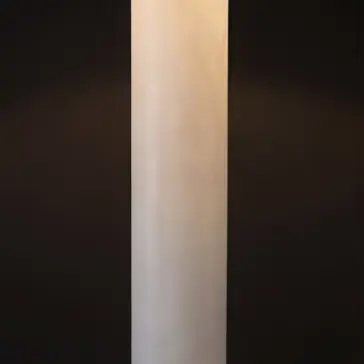 he lamp glowing warmly, casting a soft, diffused light through the frosted glass.