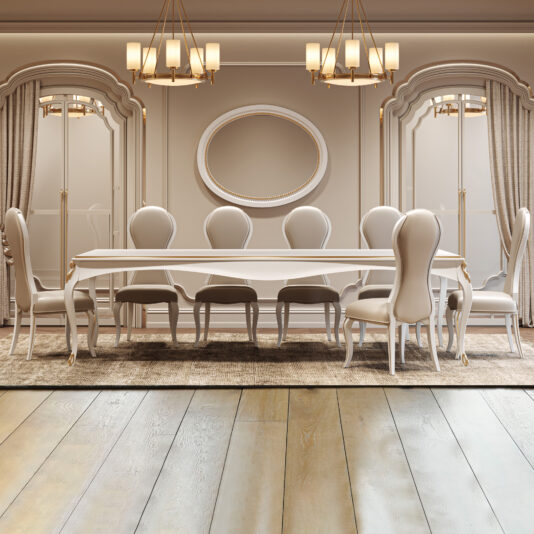 Large White Classic Style Dining Set Elegant dining room with a Large White Classic Style Dining Set (eight high-backed chairs), two gold chandeliers, round wall mirror, beige curtains, plush rug, and light wooden flooring.