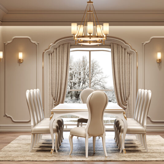 Large White Classic Style Dining Set An elegant dining room showcases the Large White Classic Style Dining Set with eight high-backed cream chairs on a neutral rug, a gold chandelier above, and large curtained windows revealing snowy trees outside.