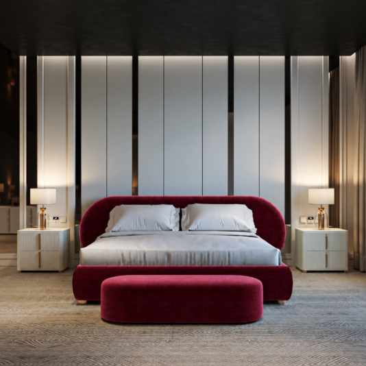 Curved Contemporary Burgundy Velvet Bed Wide front view showing the bed and oval bench against tall wall panels, flanked by bedside cabinets.
