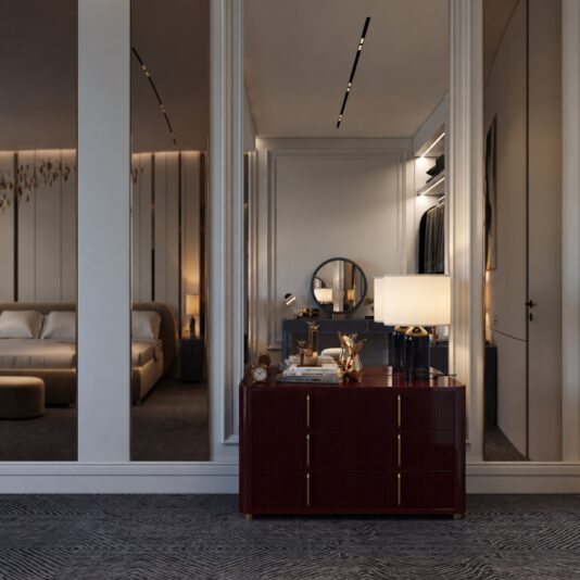 Burgundy Gloss Ribbed Chest of Drawers Deep burgundy gloss chest of drawers in a bedroom setting with a mirror and table lamp