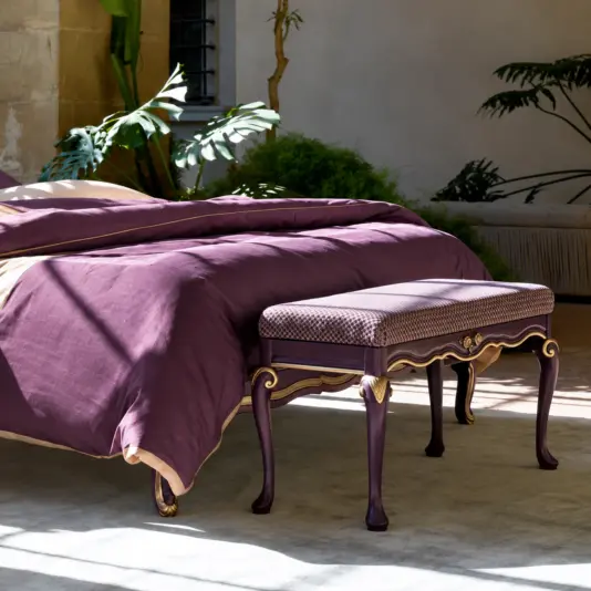 Deep Amethyst Whimsigothic Italian Bed Foot-of-bed view with deep amethyst bedding and an upholstered bench in the bedroom setting