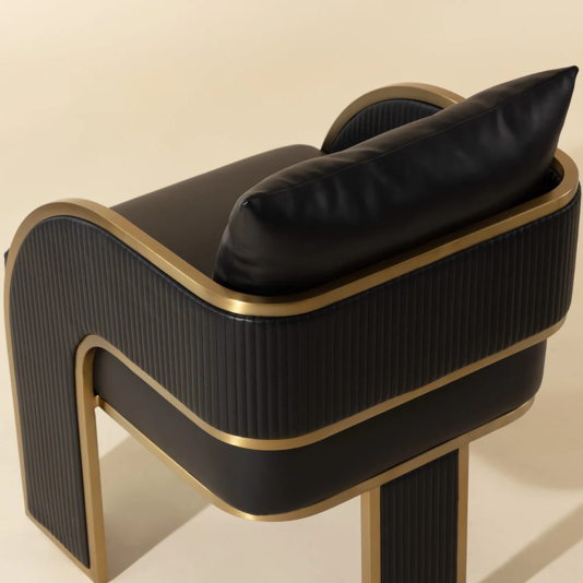 Art Deco Black Faux Leather Dining Chair Close-up of vertical stitching and metallic trim on the outer back