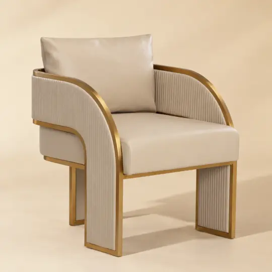 Art Deco faux leather beige dining chair with gold frame, viewed from the front