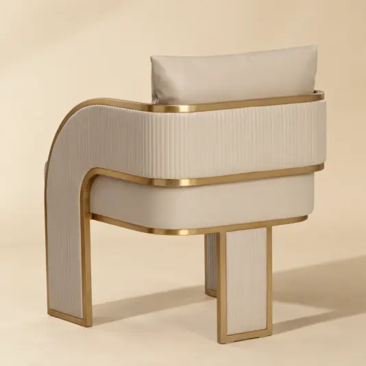 Art Deco Faux Leather Beige Dining Chair Rear side view of the beige and gold dining chair with channel-stitched outer back