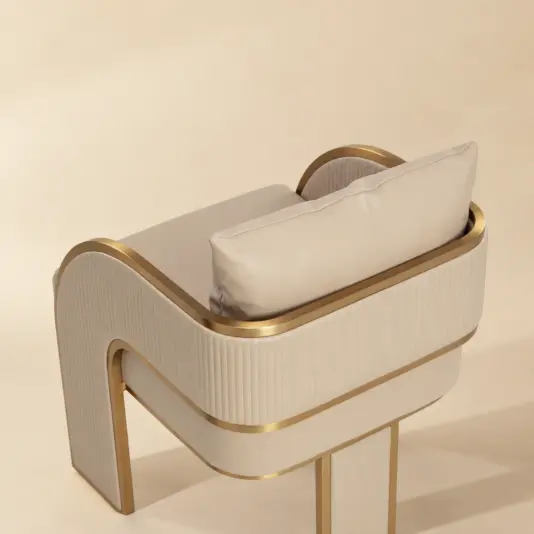 Art Deco Faux Leather Beige Dining Chair Back detail of the Art Deco beige dining chair with gold trim and channel stitching