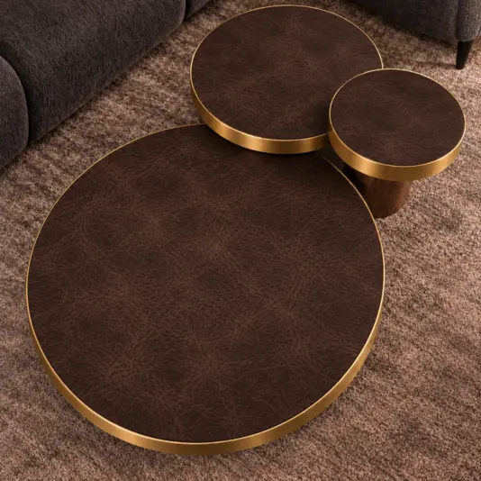 Set Of 3 Brown Leather And Brass Coffee Tables Overhead view of three matching chocolate leather-covered surfaces and warm satin metal edging.
